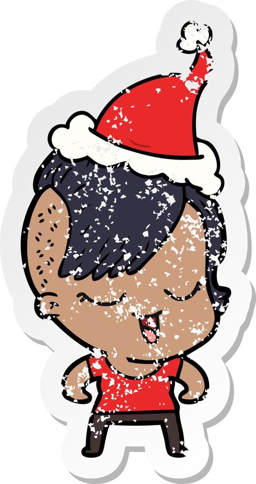 happy distressed sticker cartoon of a girl wearing santa hat vector