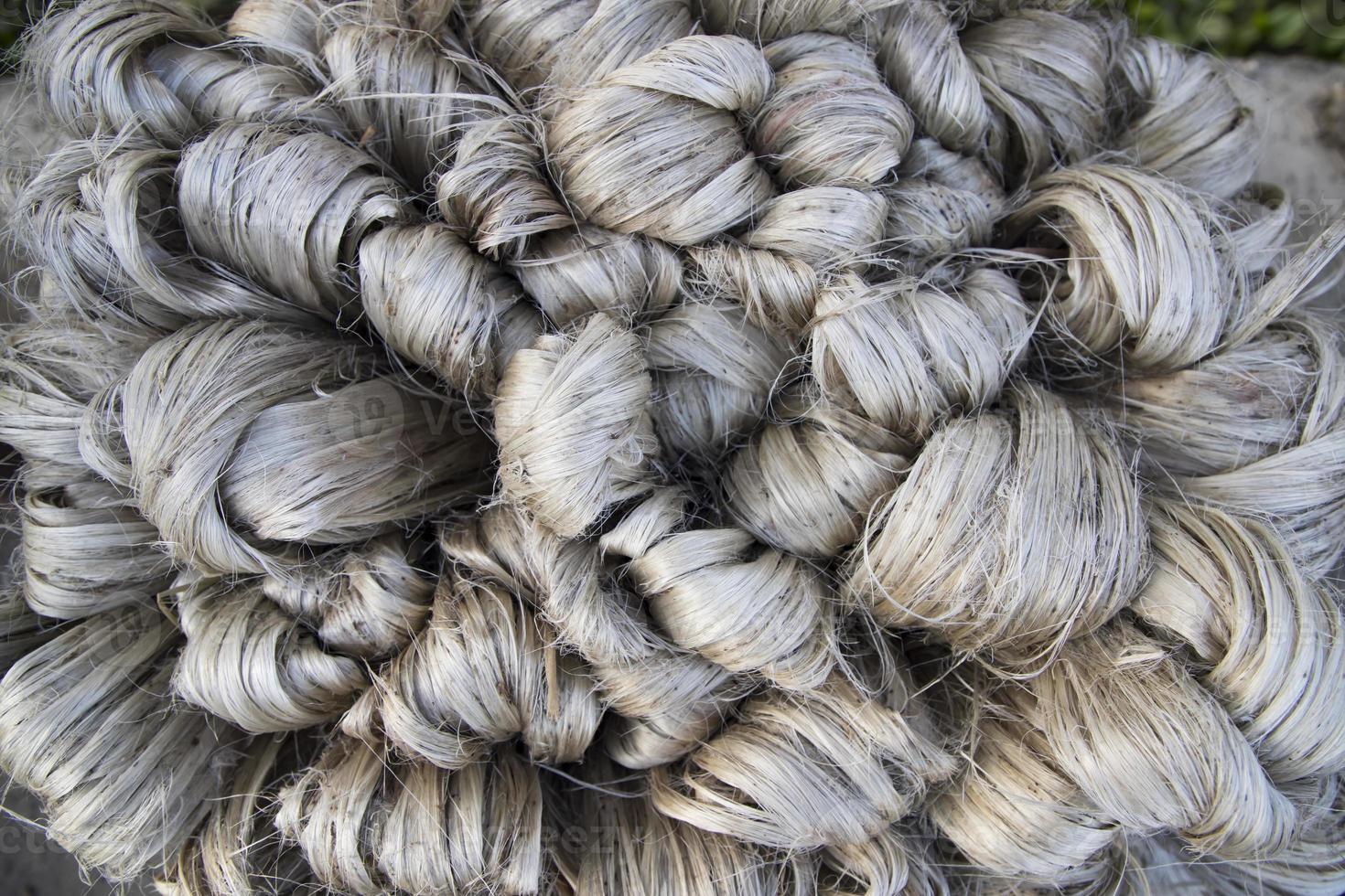 thick brown bundle of raw jute fiber Texture Background photo