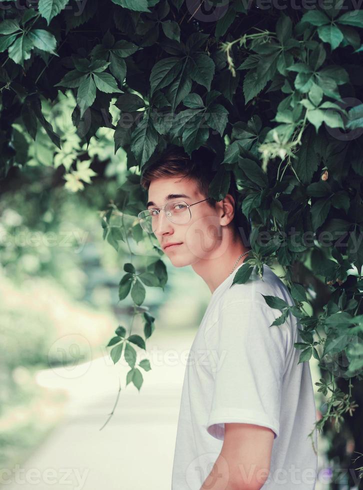 fashionable portrait of a man in a white T-shirt photo