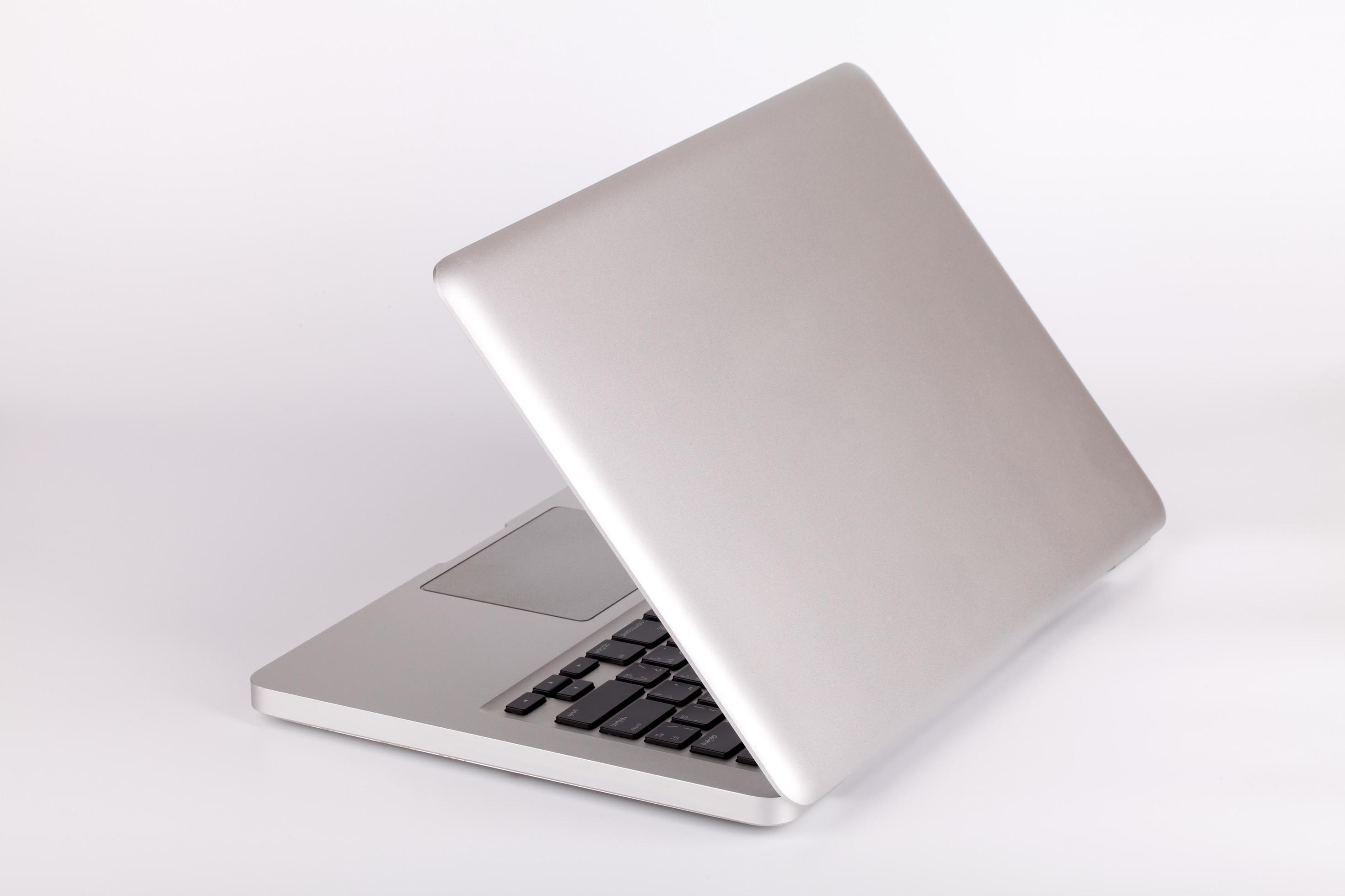 Laptop on white background 9805920 Stock Photo at Vecteezy