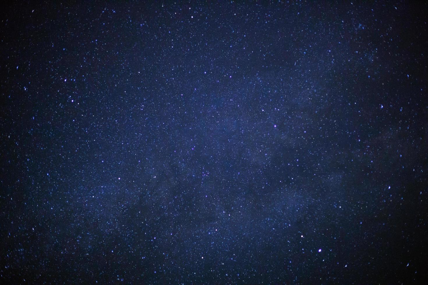 milky way galaxy and space dust in the universe, Long exposure photograph, with grain. photo