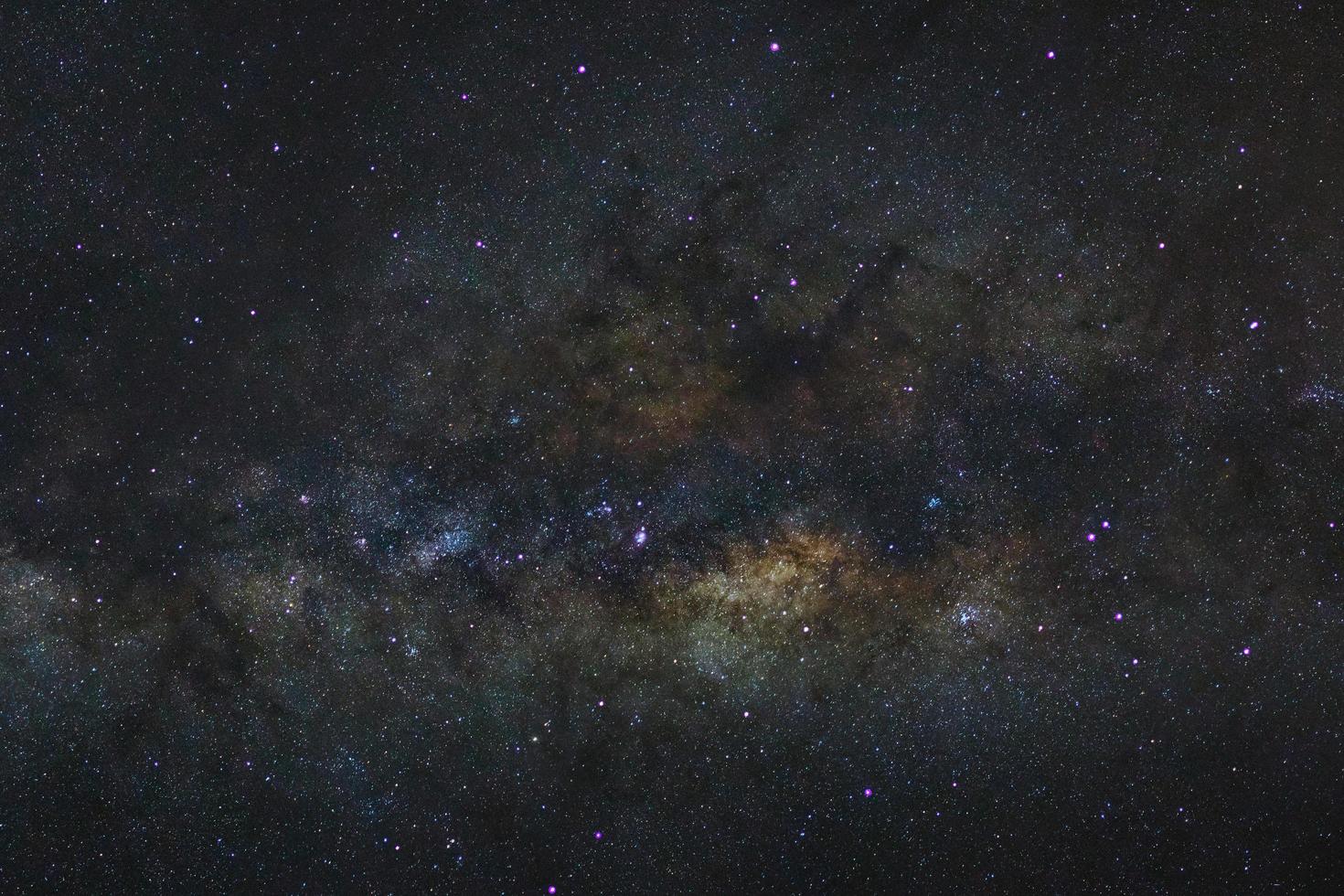 Starry night sky, Milky way galaxy with stars and space dust in the universe, Long exposure photograph, with grain. photo