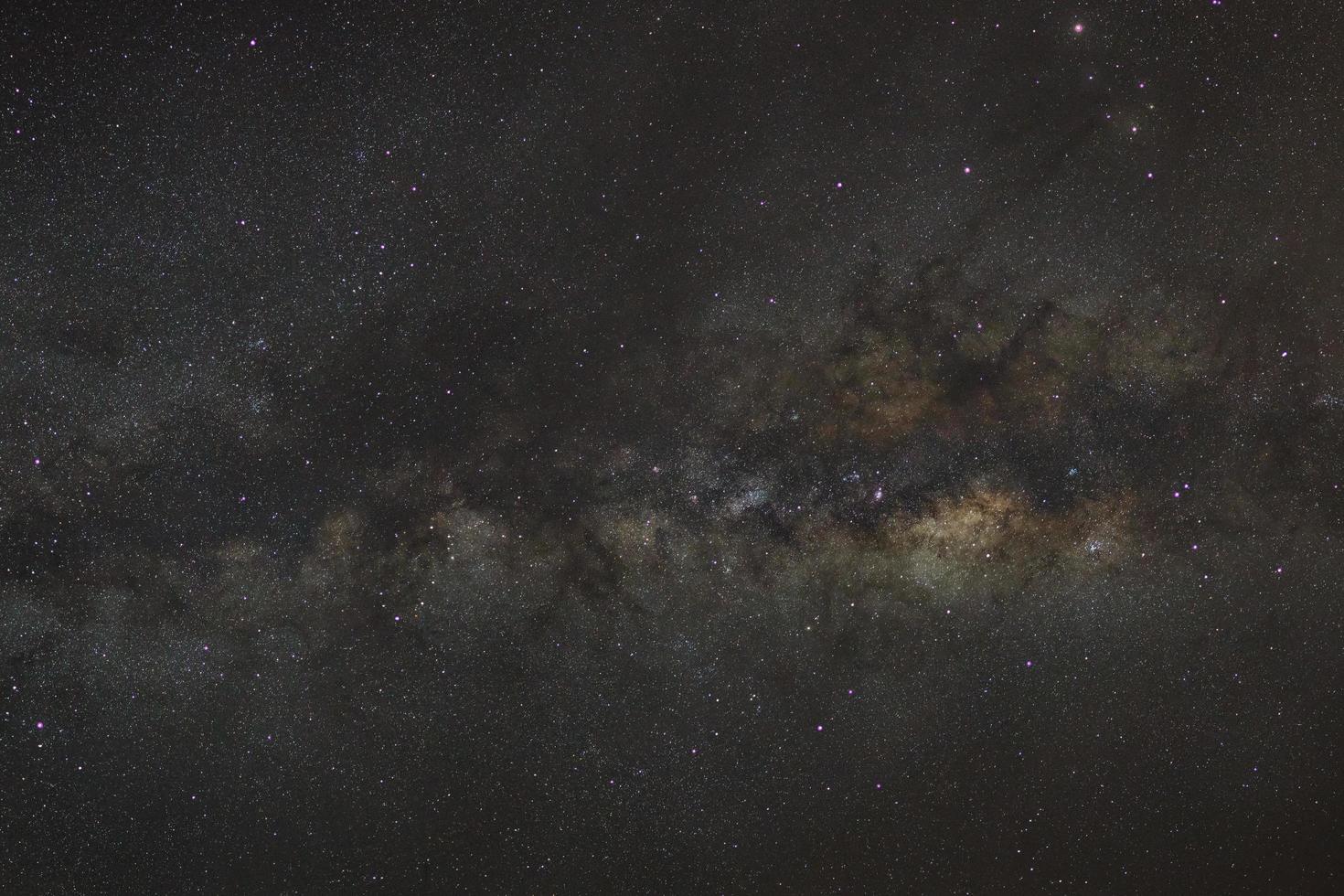 Starry night sky, Milky way galaxy with stars and space dust in the universe, Long exposure photograph, with grain. photo