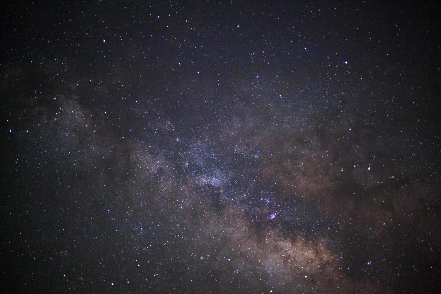 milky way galaxy with cloud and space dust in the universe, Long exposure photograph, with grain. photo