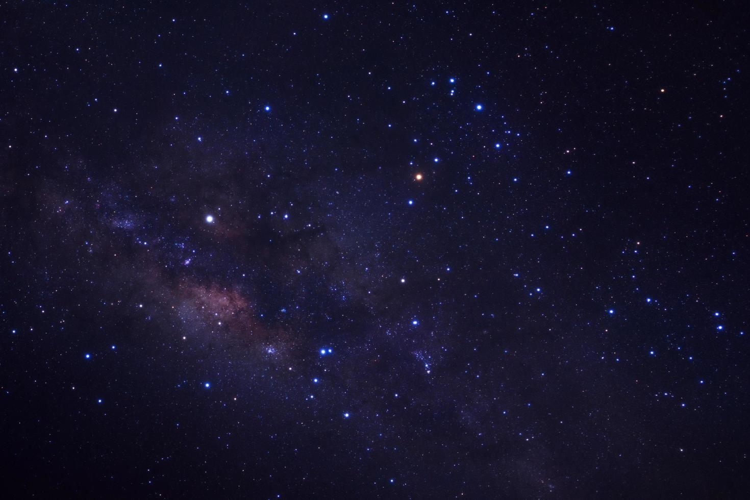 milky way galaxy and space dust in the universe, Long exposure photograph, with grain. photo