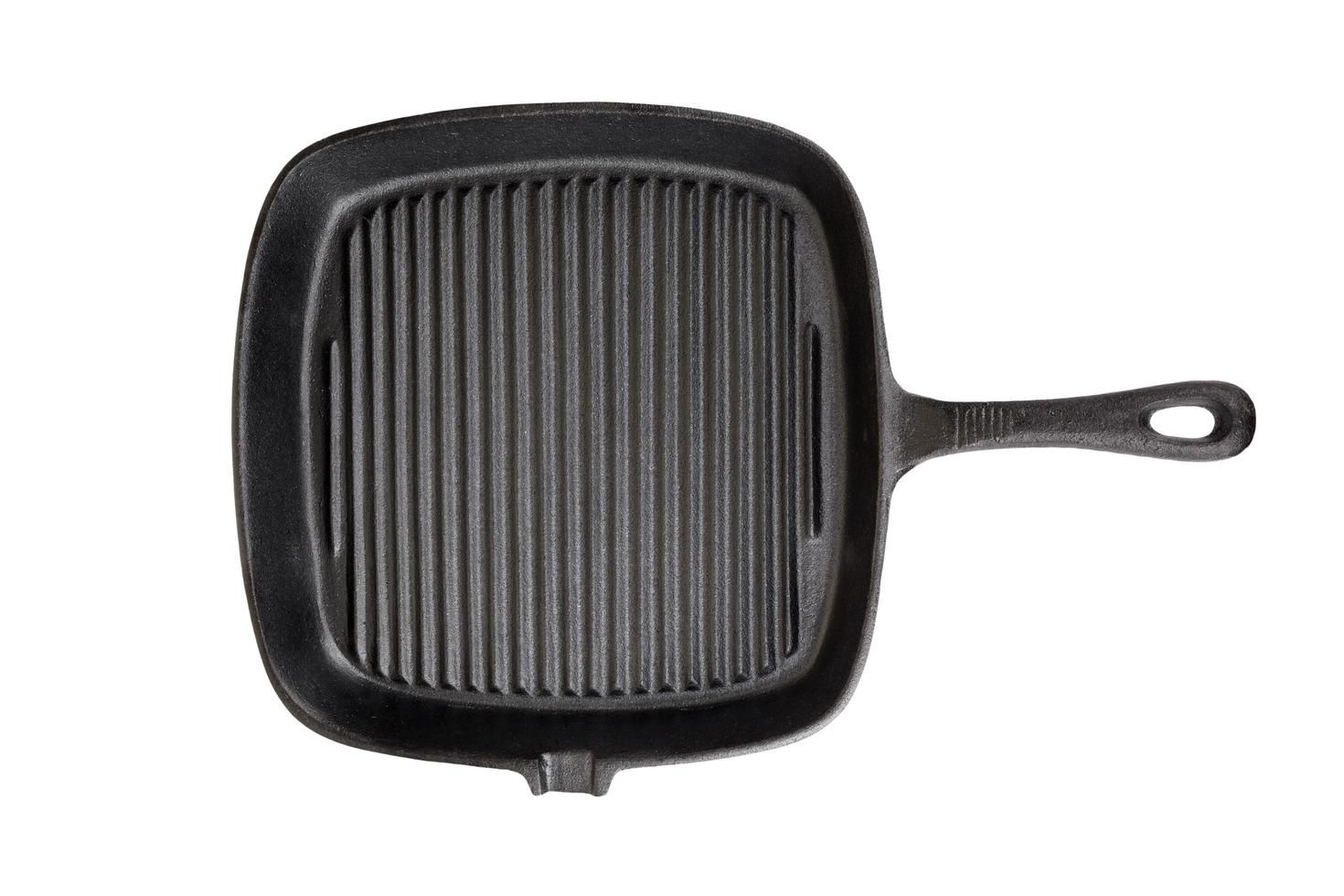 Empty grill iron pan isolated on white background photo