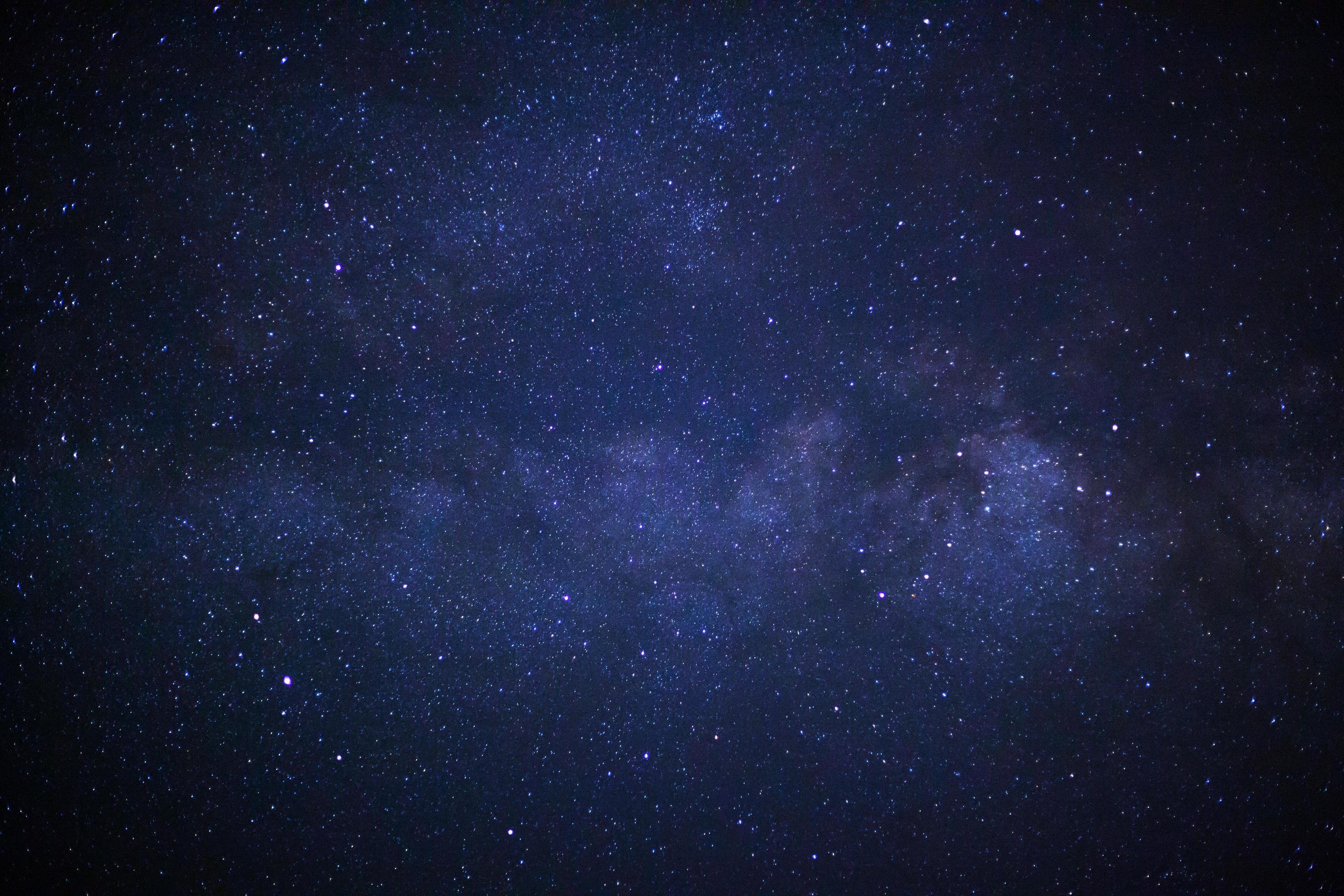 milky way galaxy with cloud and space dust in the universe, Long exposure photograph, with grain
