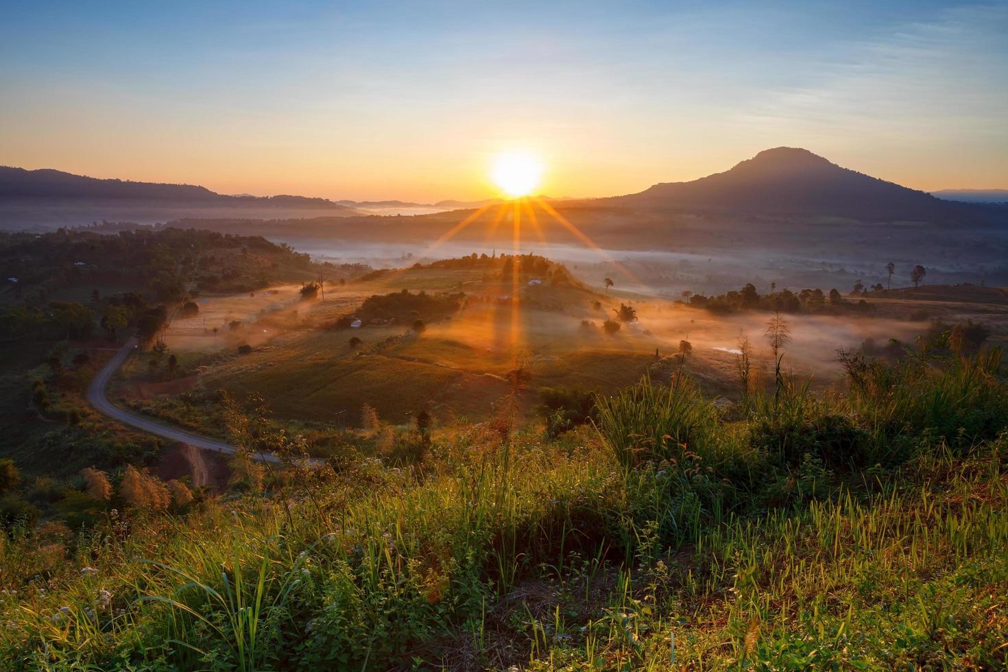 Misty morning sunrise and house in Khao Takhian Ngo View Point at Khao-kho Phetchabun,Thailand photo