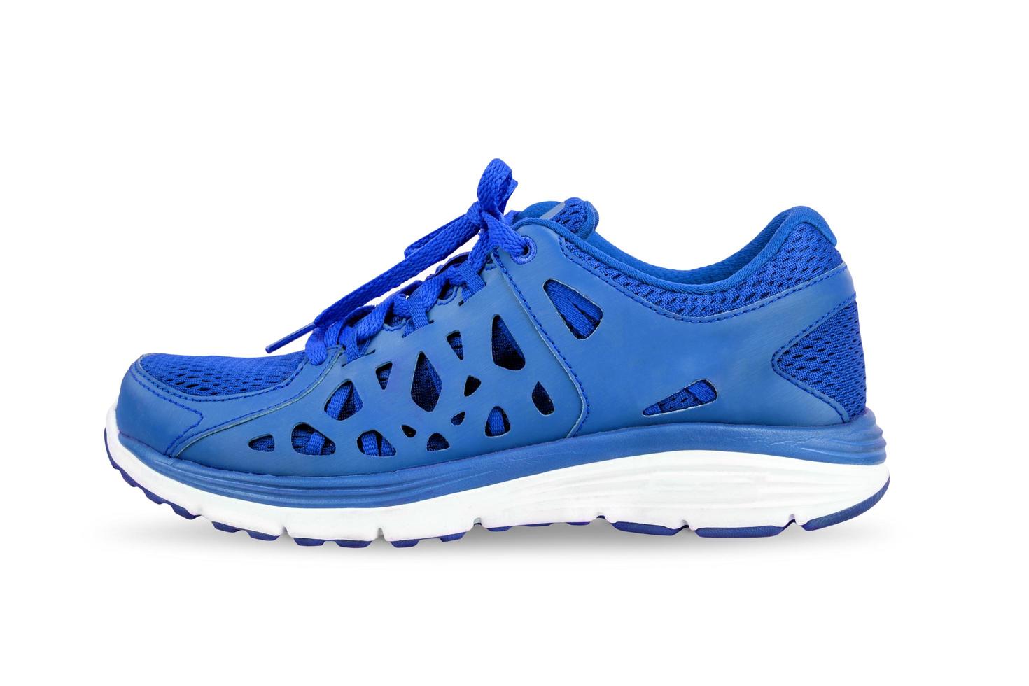 blue sport running shoes isolated on white background photo