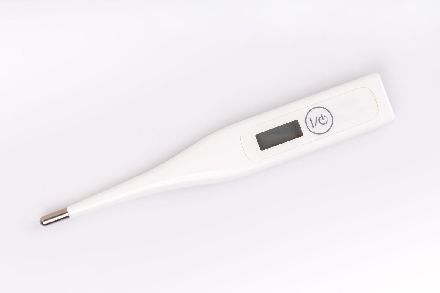 Thermometer on white background photo