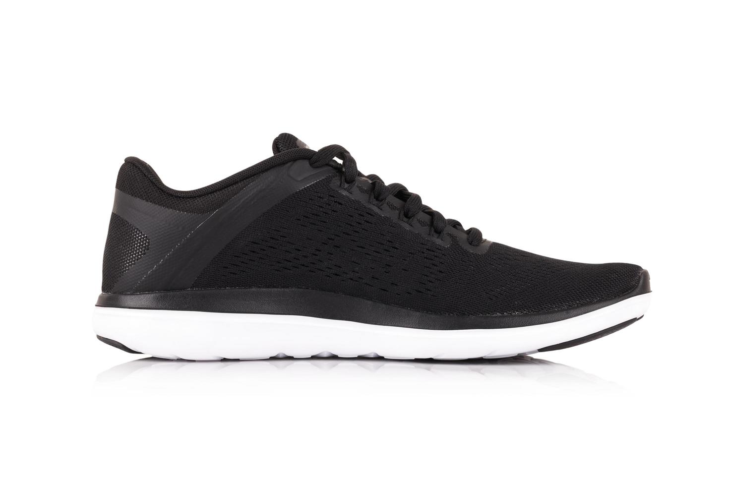 Black sport shoes isolated on white background photo