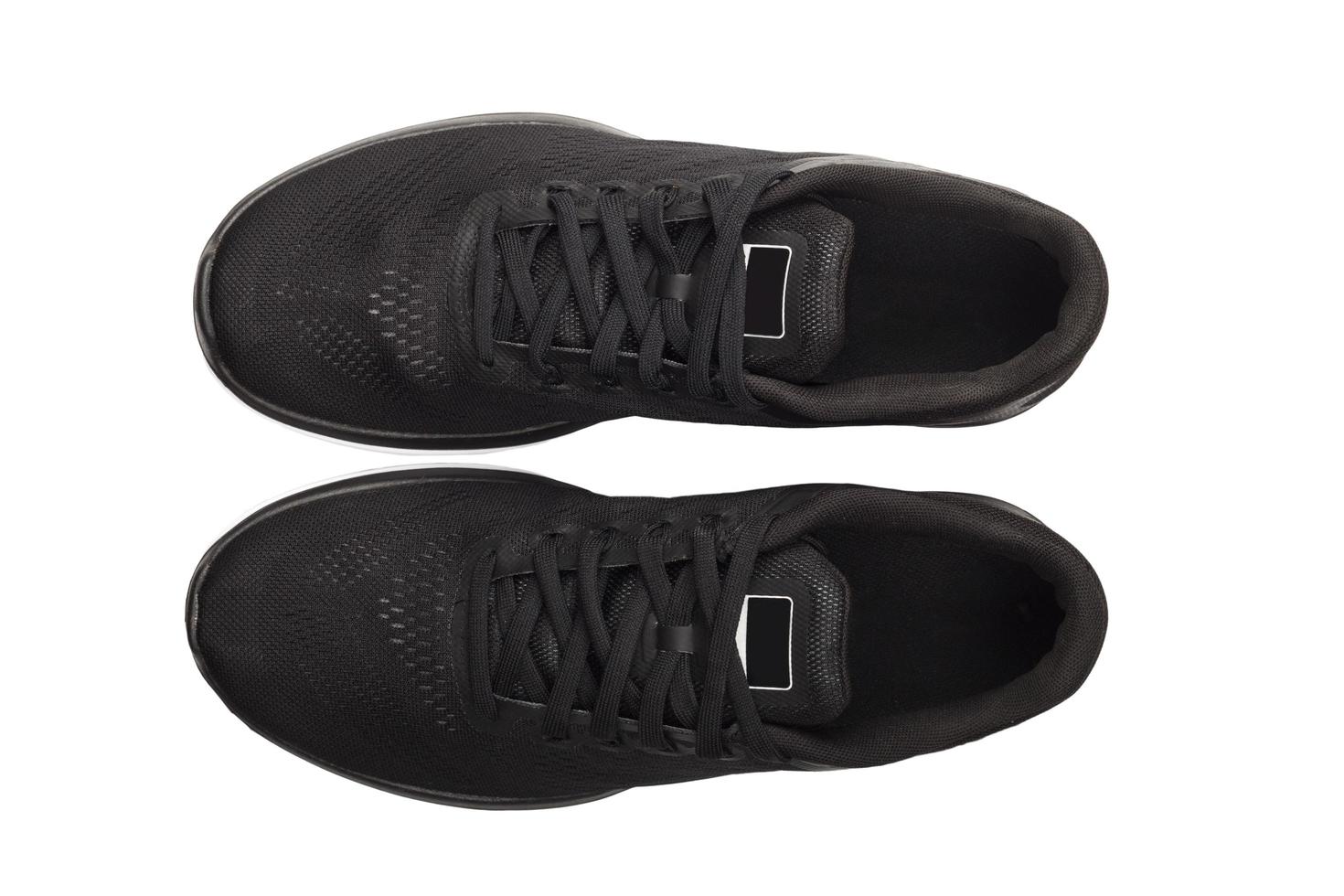Black sport shoes isolated on white background photo