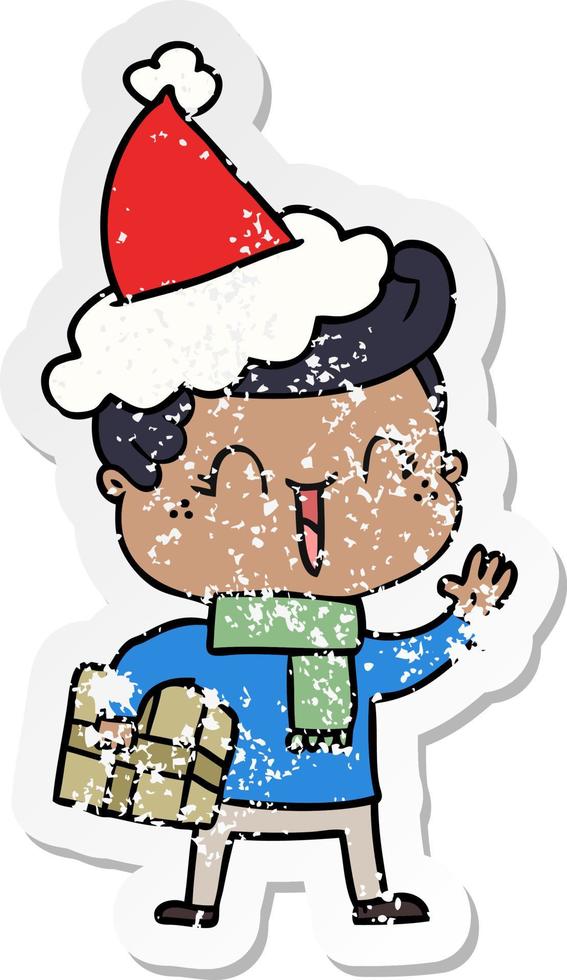 distressed sticker cartoon of a laughing boy wearing santa hat vector