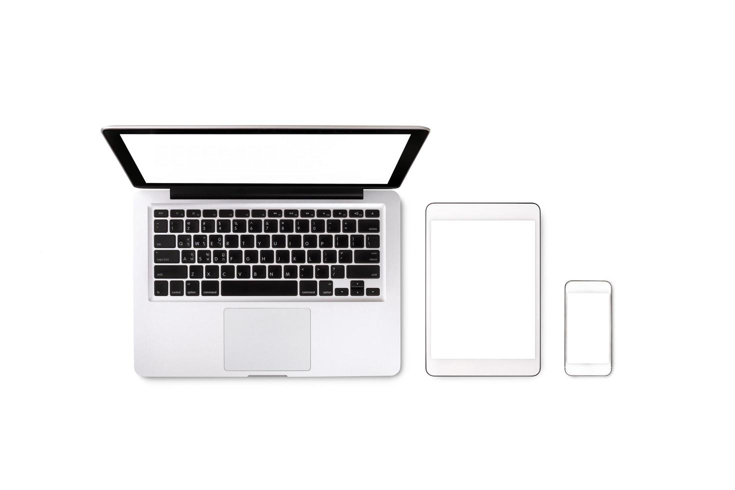 Laptop tablet and smartphone on white background with text space and copy space photo