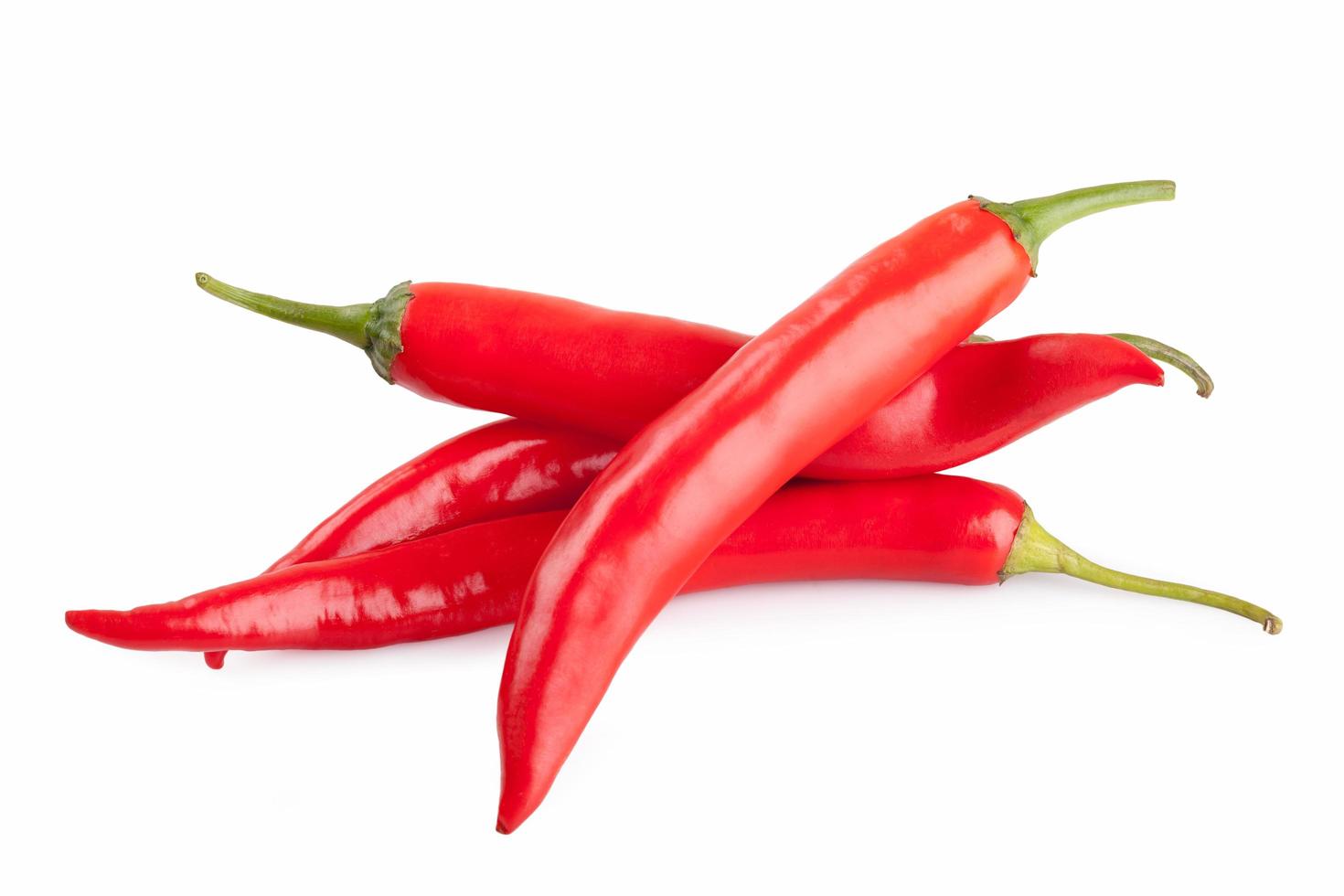 red chili or chilli cayenne pepper isolated on white background photo