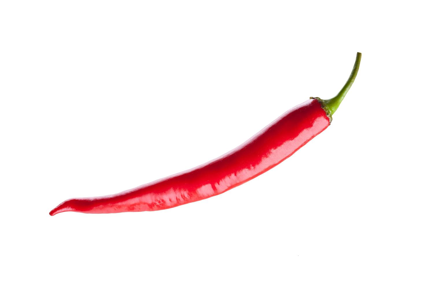 red chili or chilli cayenne pepper isolated on white background photo