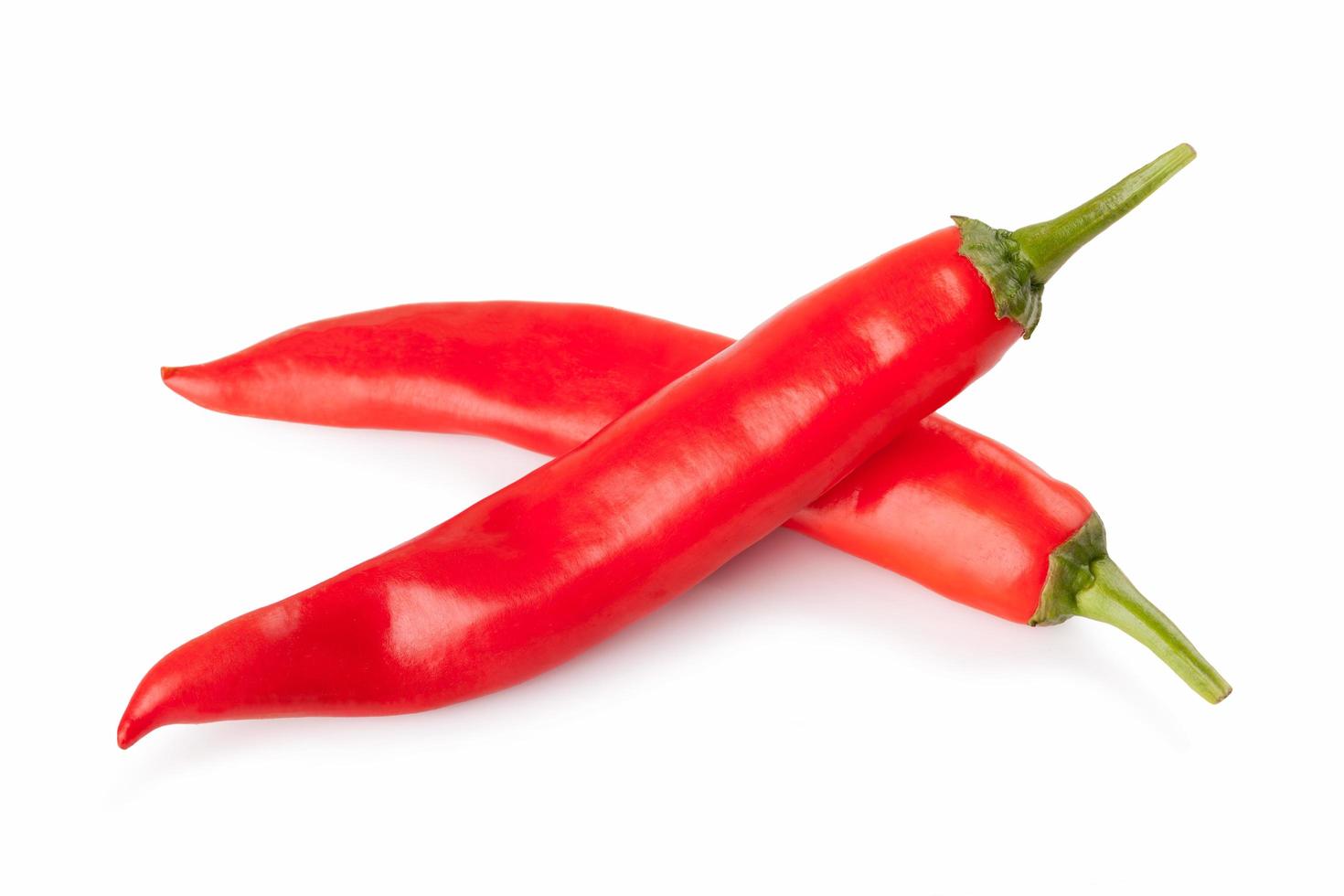 red chili or chilli cayenne pepper isolated on white background photo