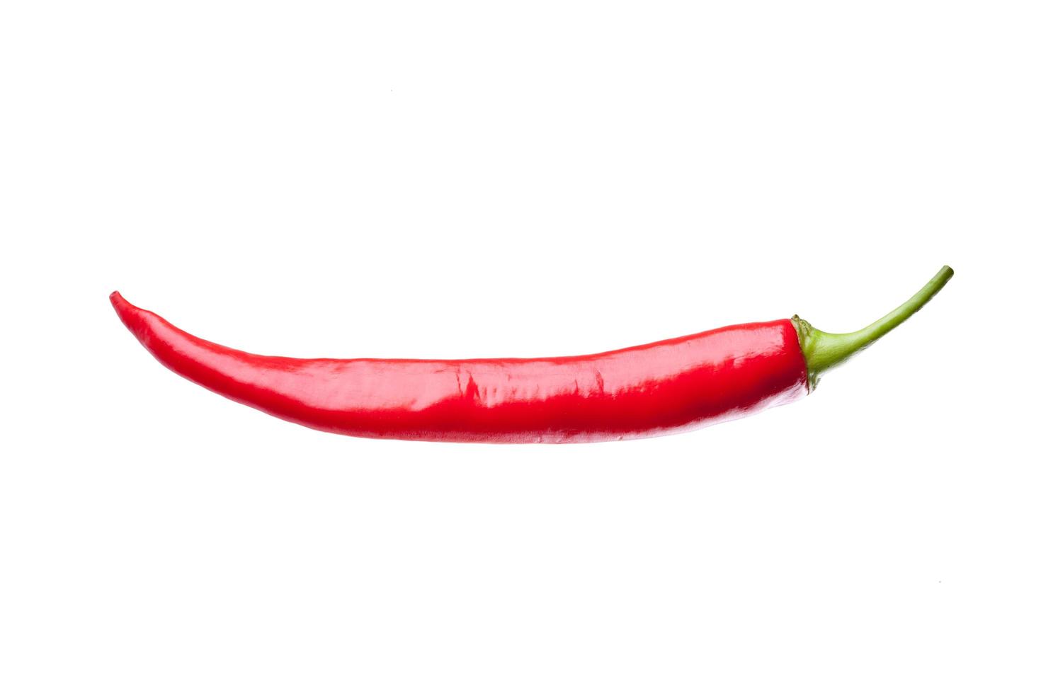 red chili or chilli cayenne pepper isolated on white background photo