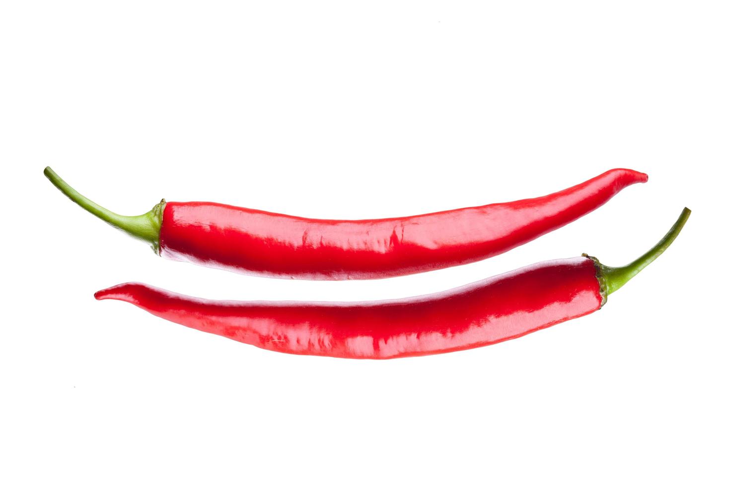 red chili or chilli cayenne pepper isolated on white background photo