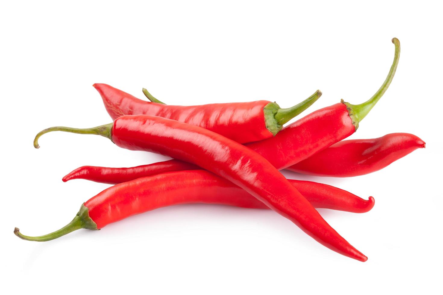 red chili or chilli cayenne pepper isolated on white background photo