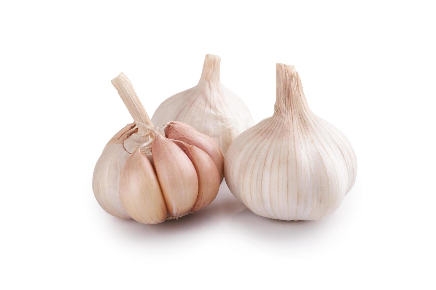 Fresh garlic isolated on white background photo