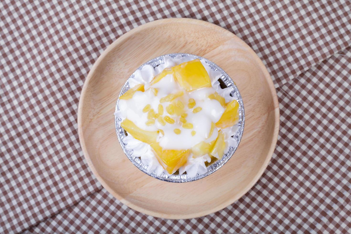 mango cupcake with coconut milk photo