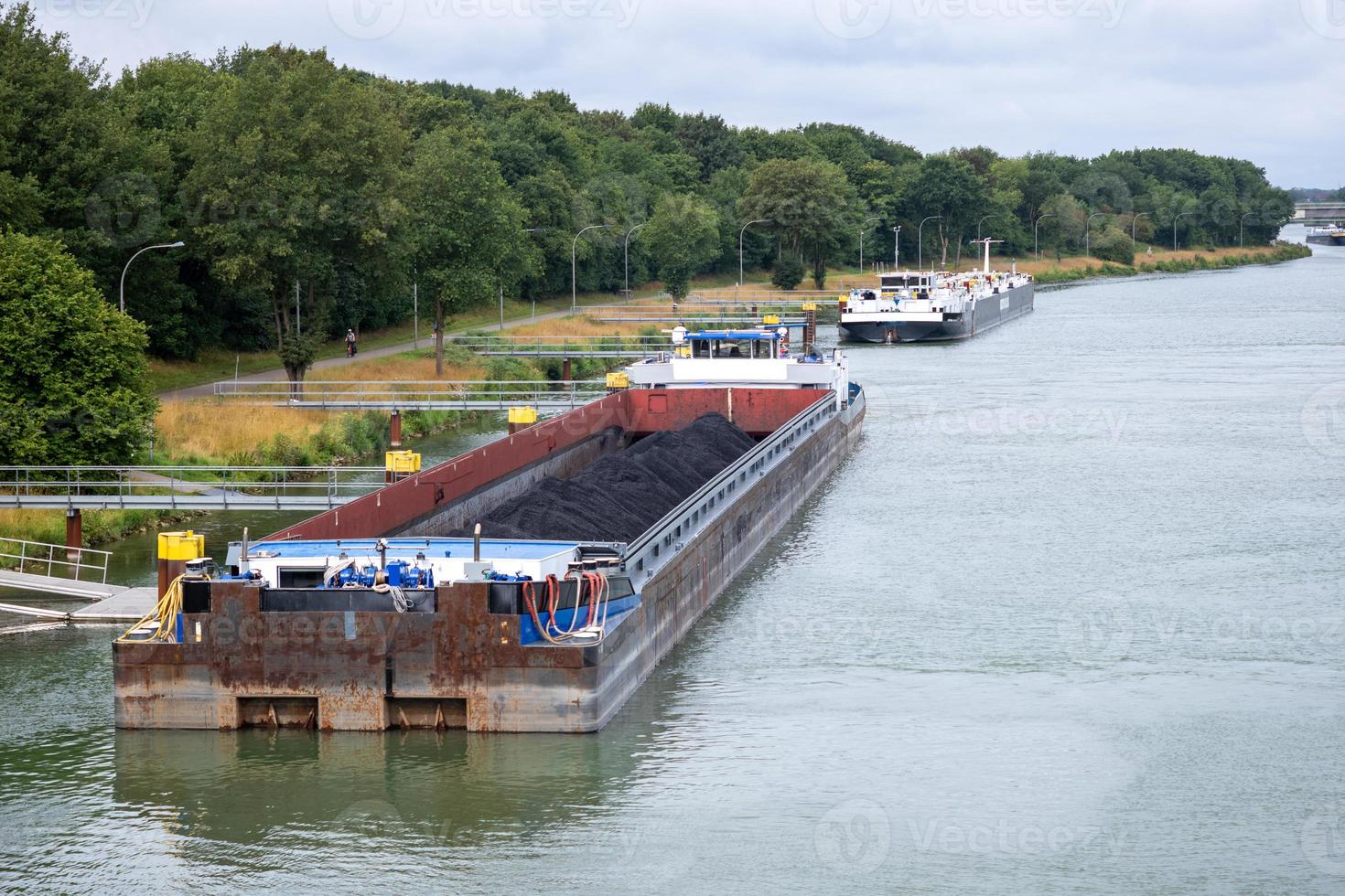 Inland vessel moored to a canal photo