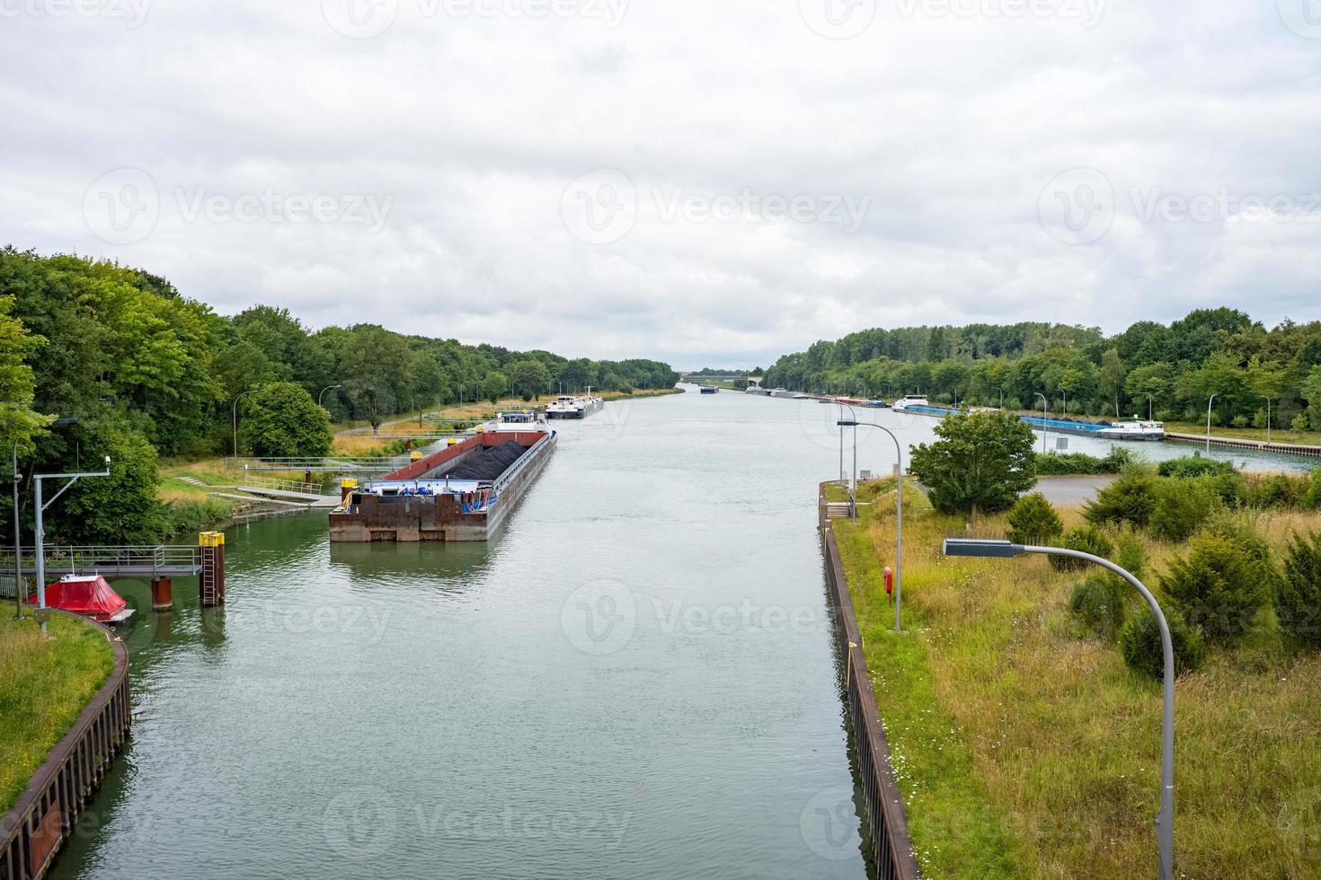 Inland vessel moored to a canal photo