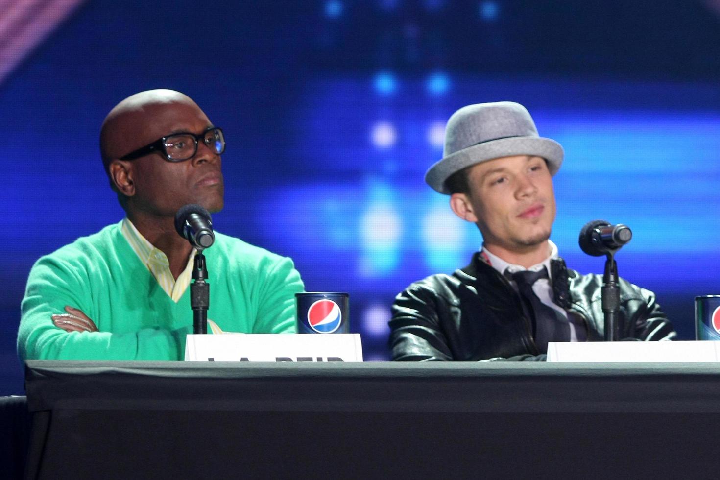 LOS ANGELES, DEC 19 - L A Reid, Chris Rene at the FOX s The X Factor Press Conference at CBS Studios on December 19, 2011 in Los Angeles, CA photo