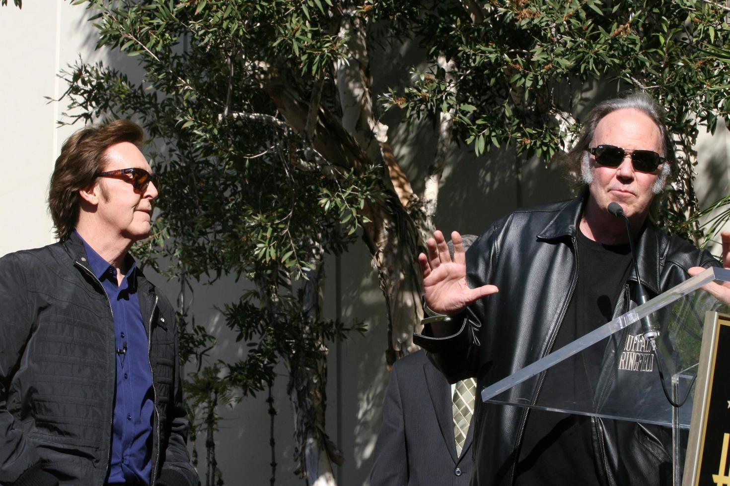 LOS ANGELES, FEB 9 - Paul McCartney, Neil Young at the Hollywood Walk of Fame Ceremony for Paul McCartney at Capital Records Building on February 9, 2012 in Los Angeles, CA photo