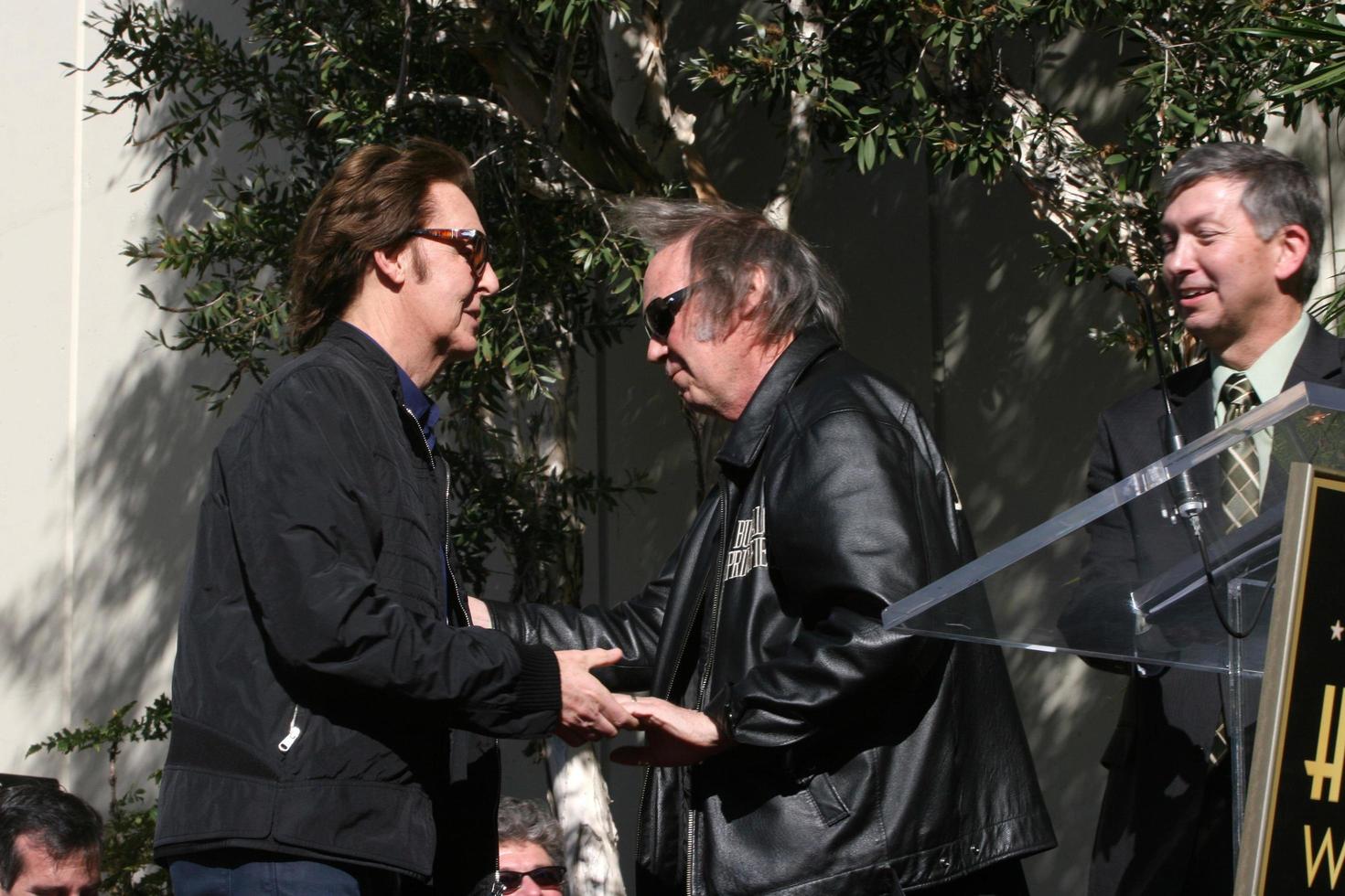 LOS ANGELES, FEB 9 - Paul McCartney, Neil Young at the Hollywood Walk of Fame Ceremony for Paul McCartney at Capital Records Building on February 9, 2012 in Los Angeles, CA photo