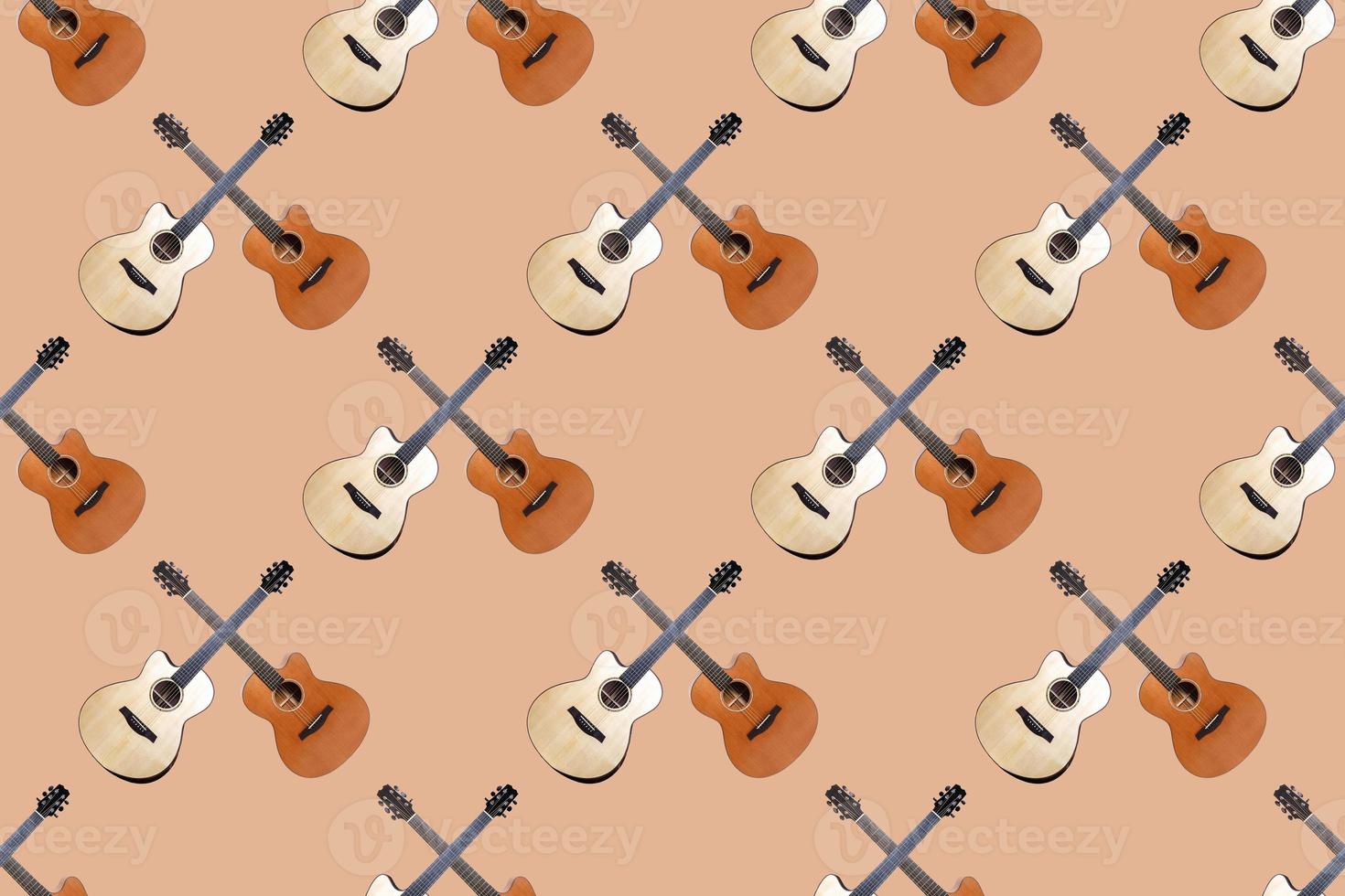 Seamless pattern of wood texture of lower deck of six strings acoustic guitar on orange background photo