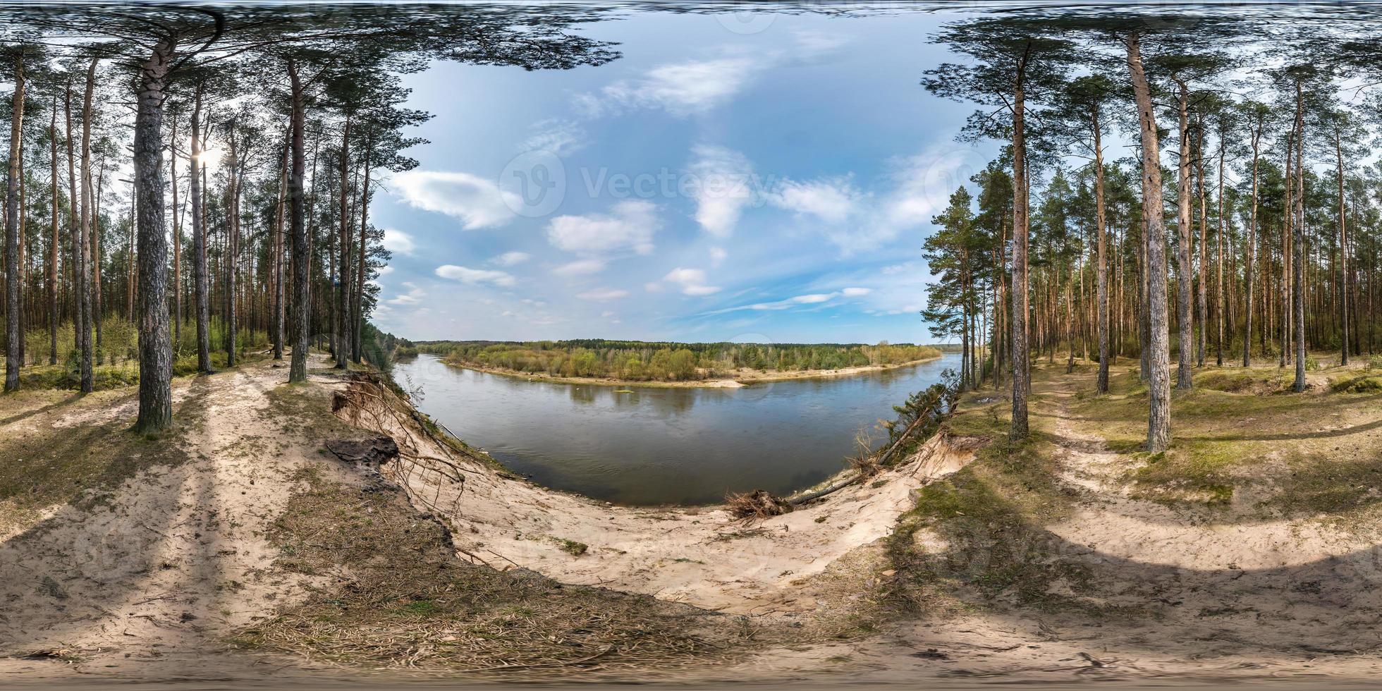 full seamless spherical panorama 360 degrees angle view on the precipice of a wide river in pinery forest in sunny summer day in equirectangular projection, ready for AR VR virtual reality content photo