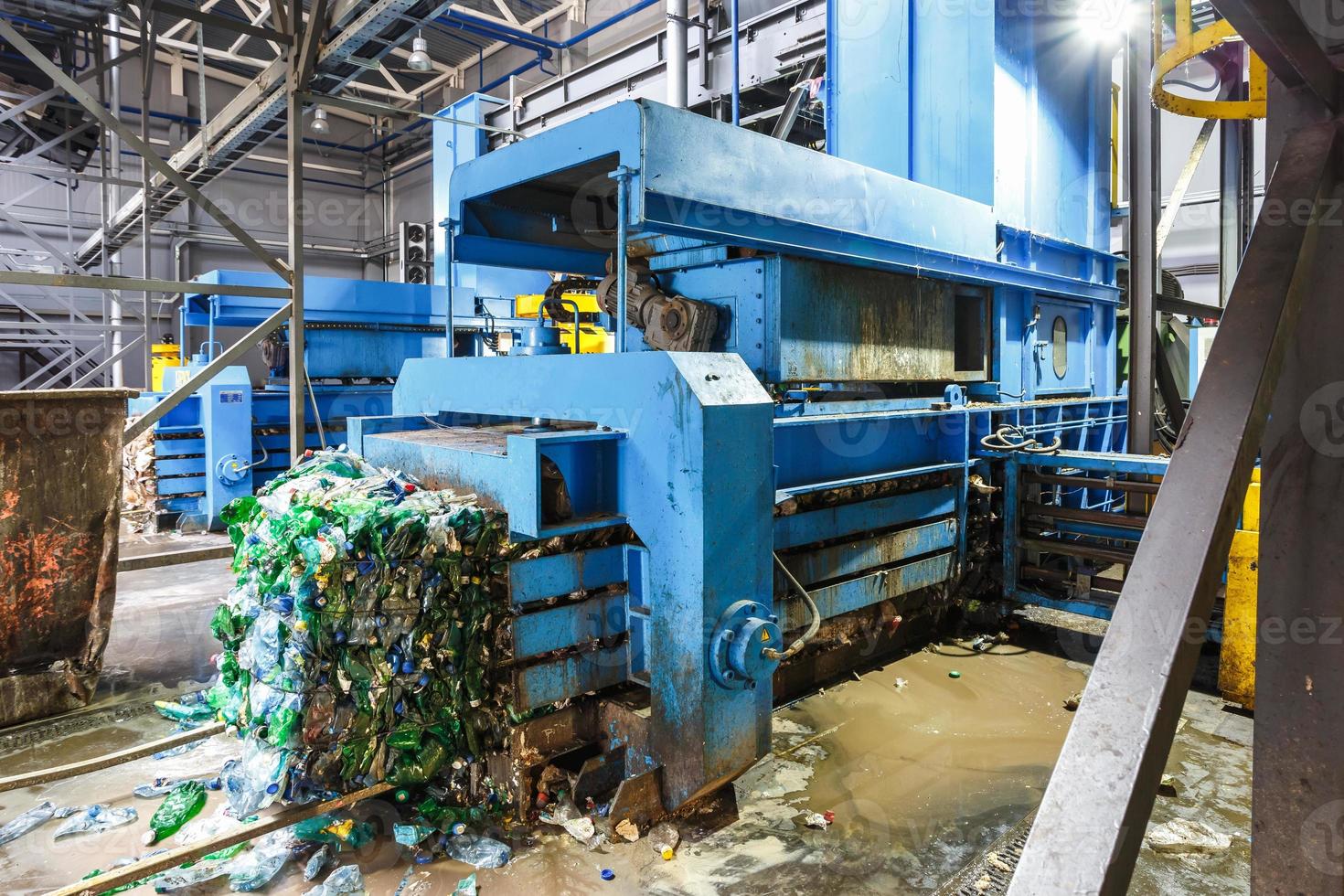 Plastic bales at the waste processing plant. Separate garbage collection. Recycling and storage of waste for further disposal. Business for sorting and processing of waste. photo