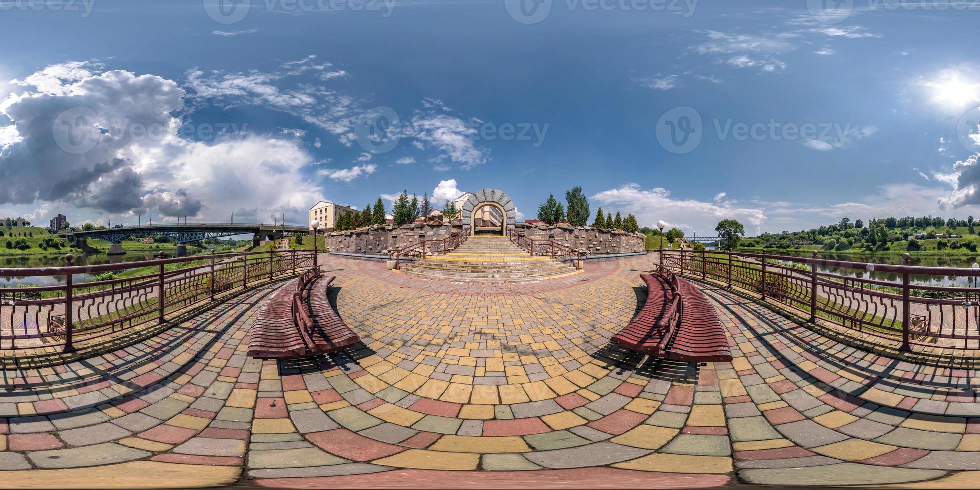 full seamless spherical hdri panorama 360 degrees angle view embankment on the stairs in front of arch and wide river near bridge in equirectangular projection, ready VR AR virtual reality content photo