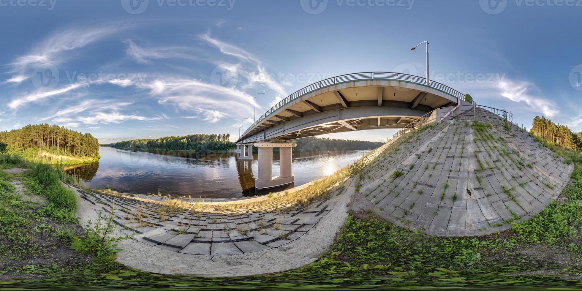 full seamless spherical hdri panorama 360 degrees angle view near steel frame construction of huge car bridge across river  in equirectangular projection. VR  AR content photo
