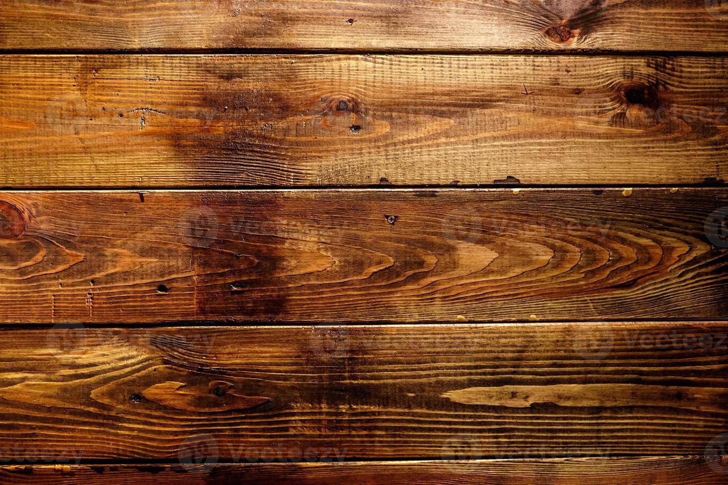 Old brown wooden boards in various colors and forms. Pattern decoration texture background for loft interior or exterior photo