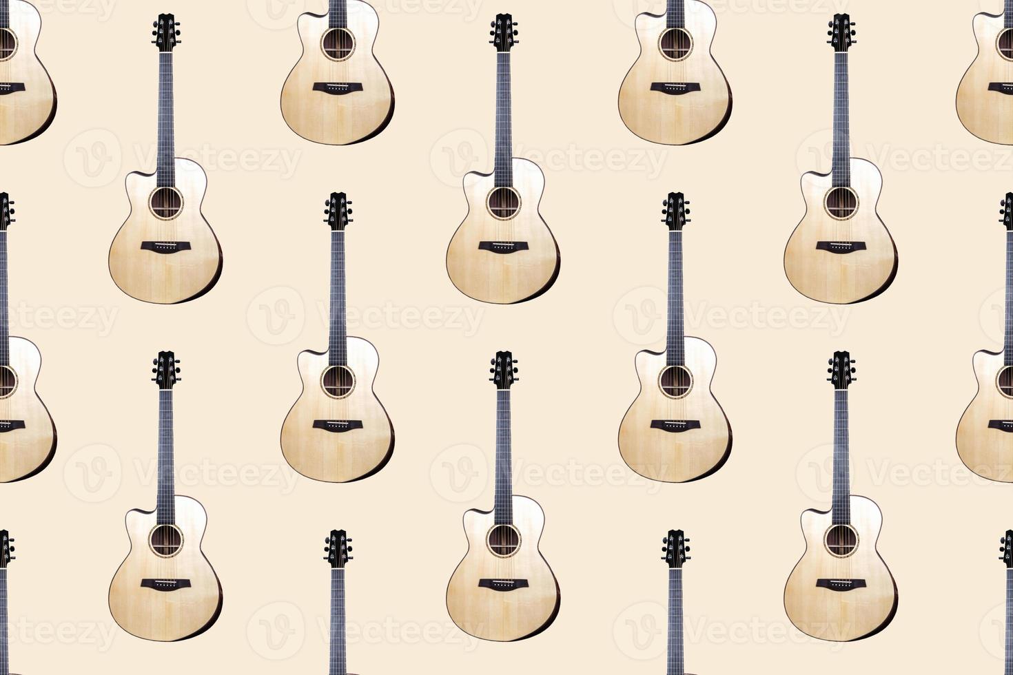 Seamless pattern of wood texture of lower deck of six strings acoustic guitar on light background photo