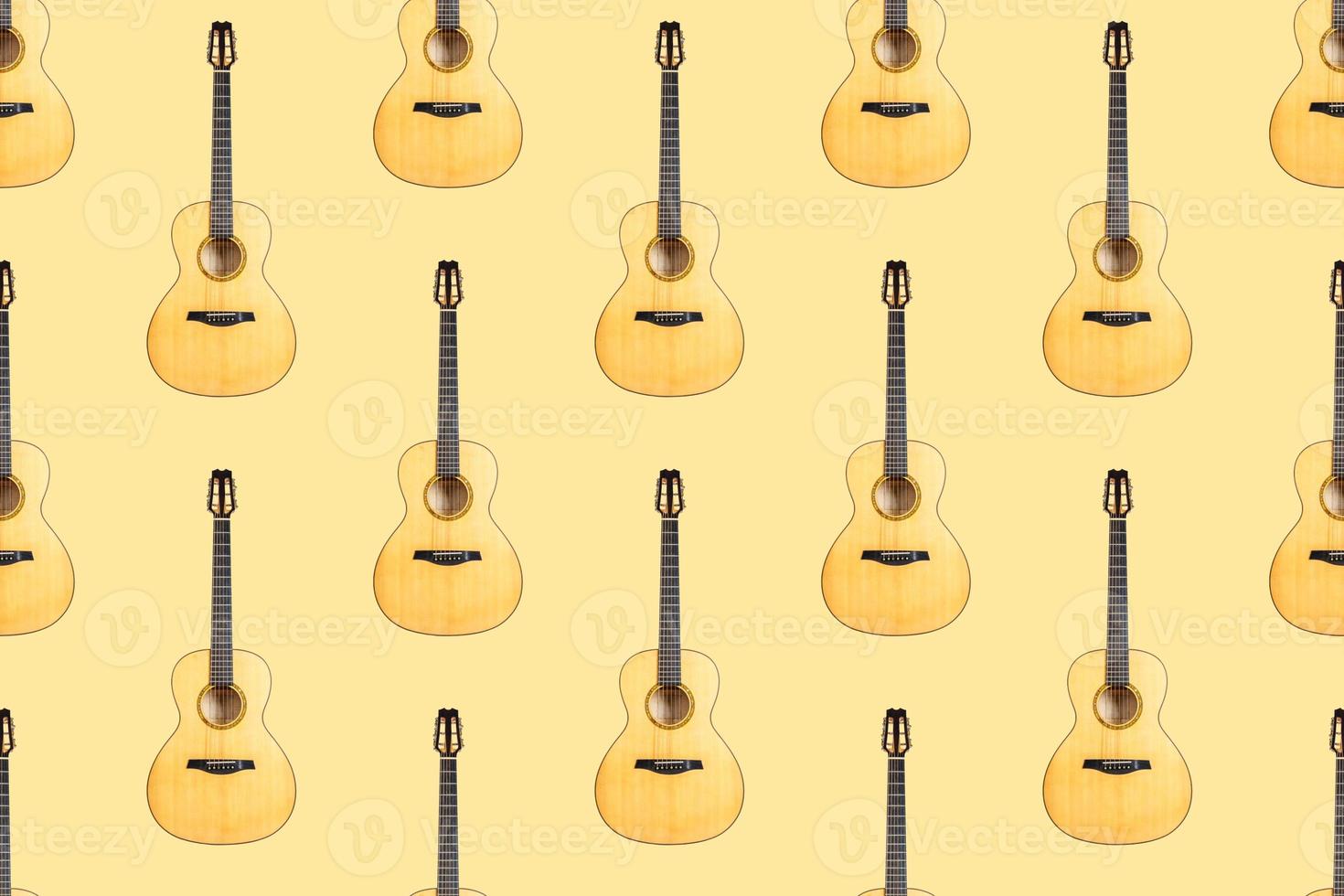 Seamless pattern of wood texture of lower deck of six strings acoustic guitar on yellow background photo