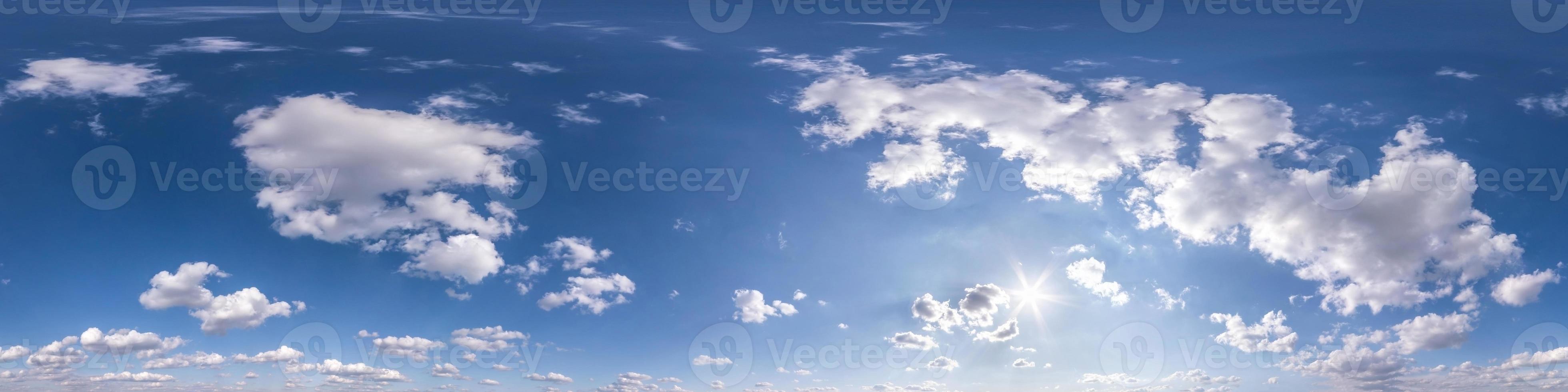 blue sky with beautiful fluffy clouds without ground. Seamless hdri panorama 360 degrees angle view for use in 3d graphics or game development as sky dome or edit drone shot photo