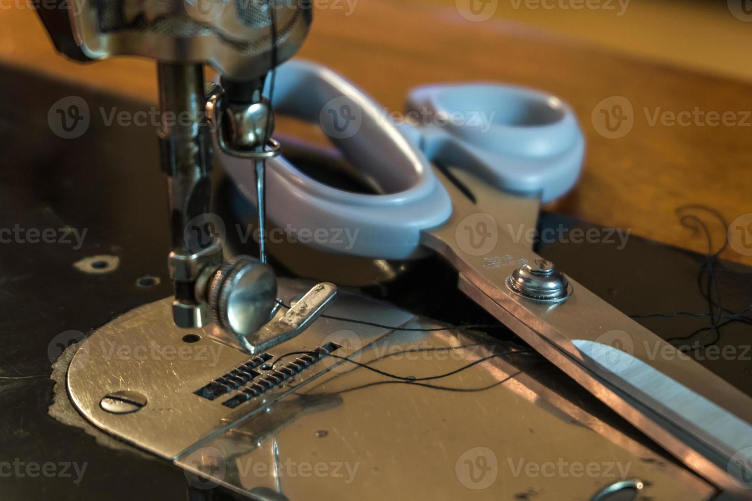 mechanism of Vintage Sewing Machine with scissors photo