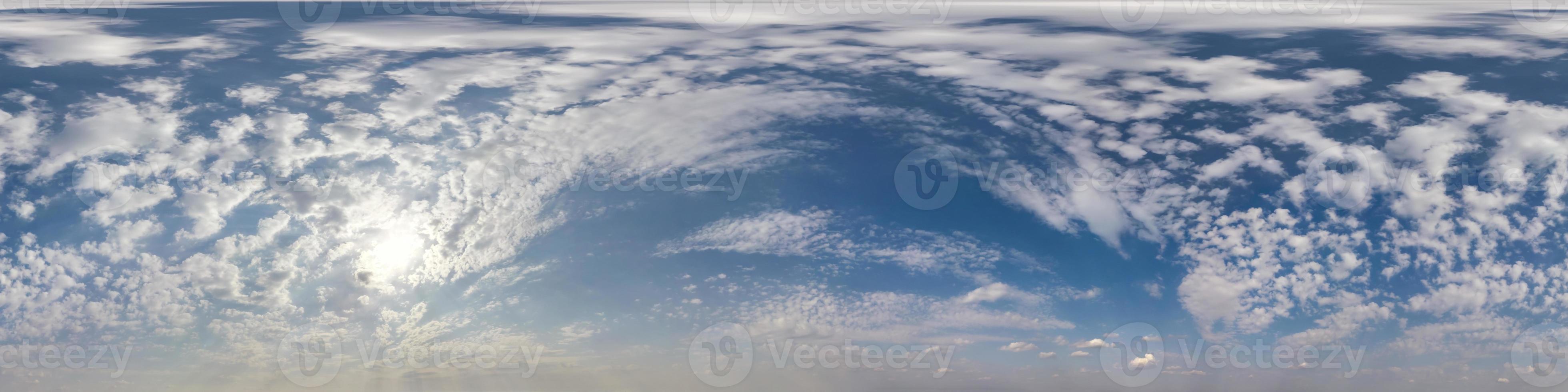 Seamless cloudy blue sky hdri panorama 360 degrees angle view with zenith and beautiful clouds for use in 3d graphics as sky dome or edit drone shot photo