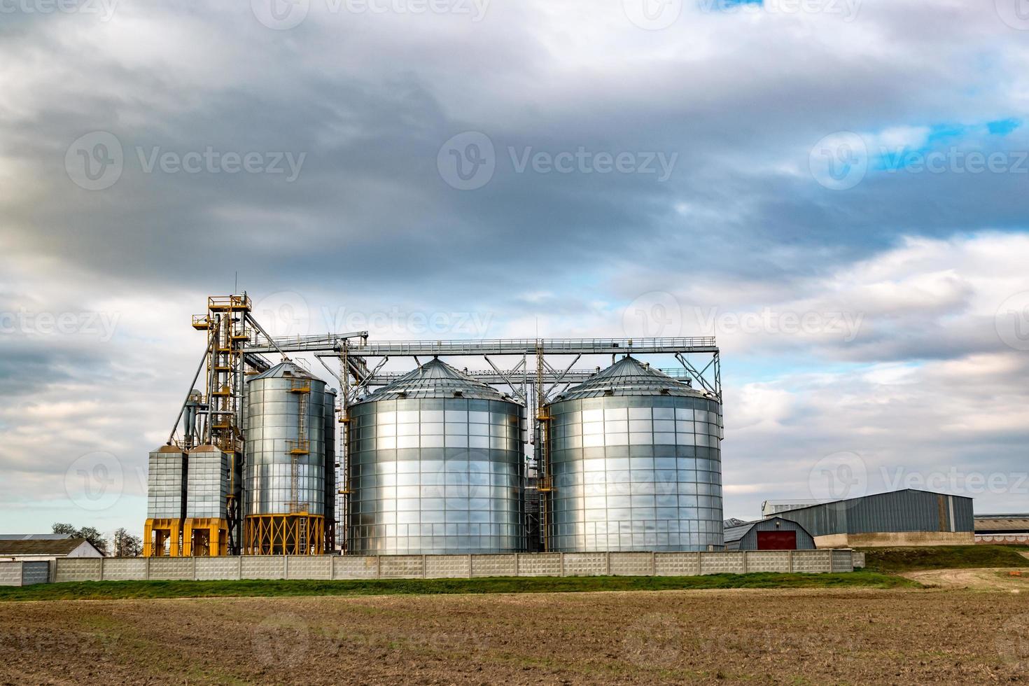 agro-processing and manufacturing plant for processing and silver silos for drying cleaning and storage of agricultural products, flour, cereals and grain. Granary elevator photo