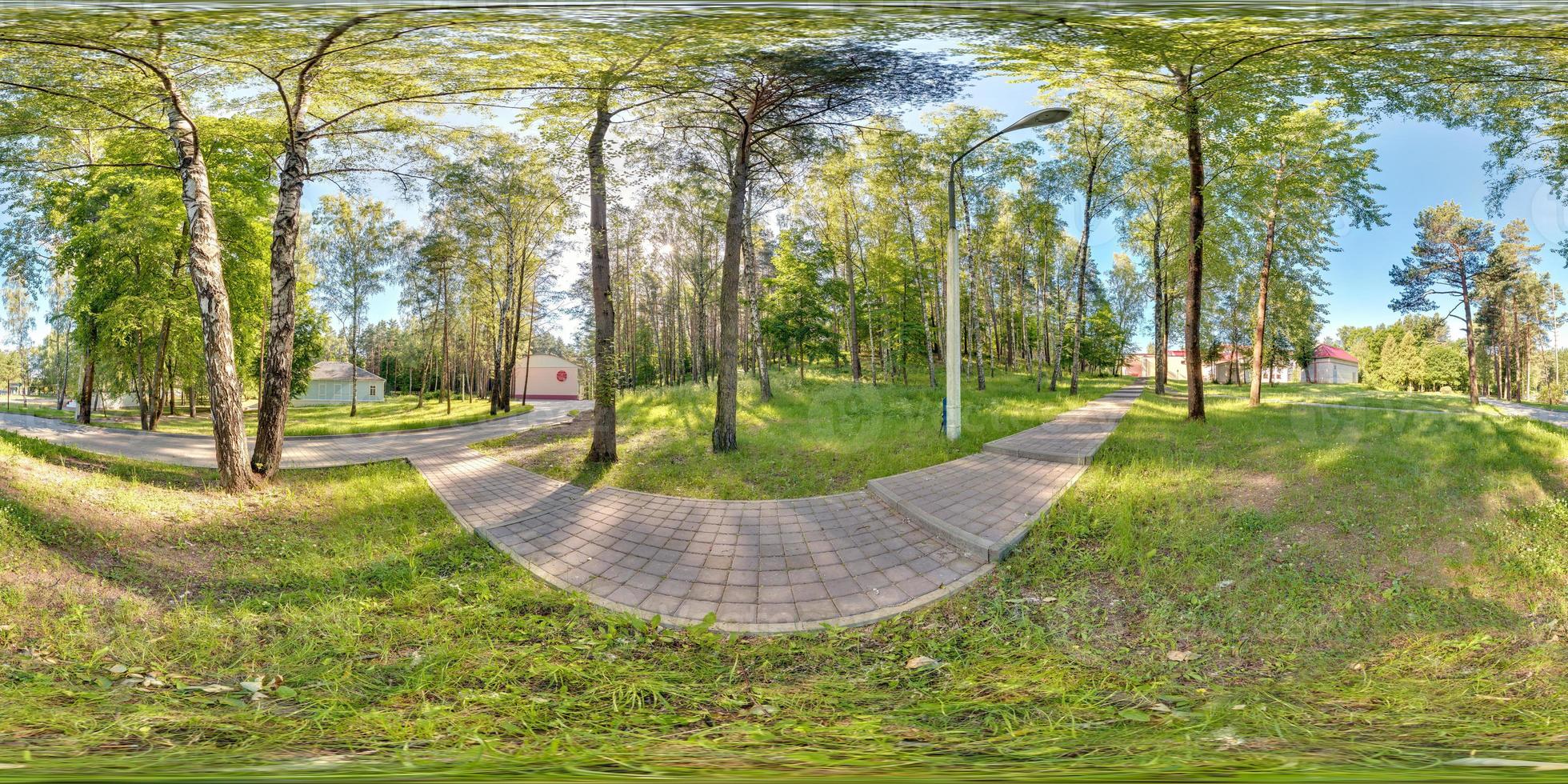 Panorama in park forest road.  Full 360 by 180 degree seamless spherical panorama in equirectangular equidistant projection. VR AR content photo