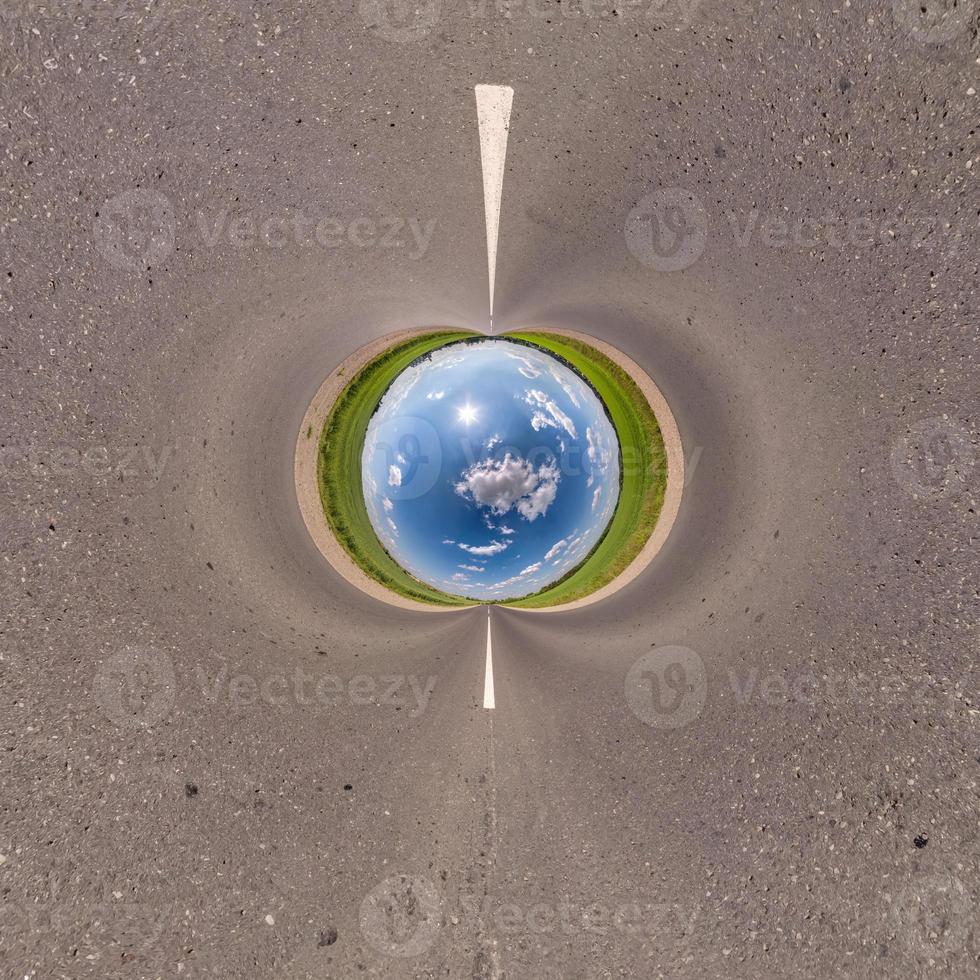Blue little planet ball. Inversion of tiny planet transformation of spherical panorama 360 degrees. Spherical abstract aerial view. Curvature of space. photo