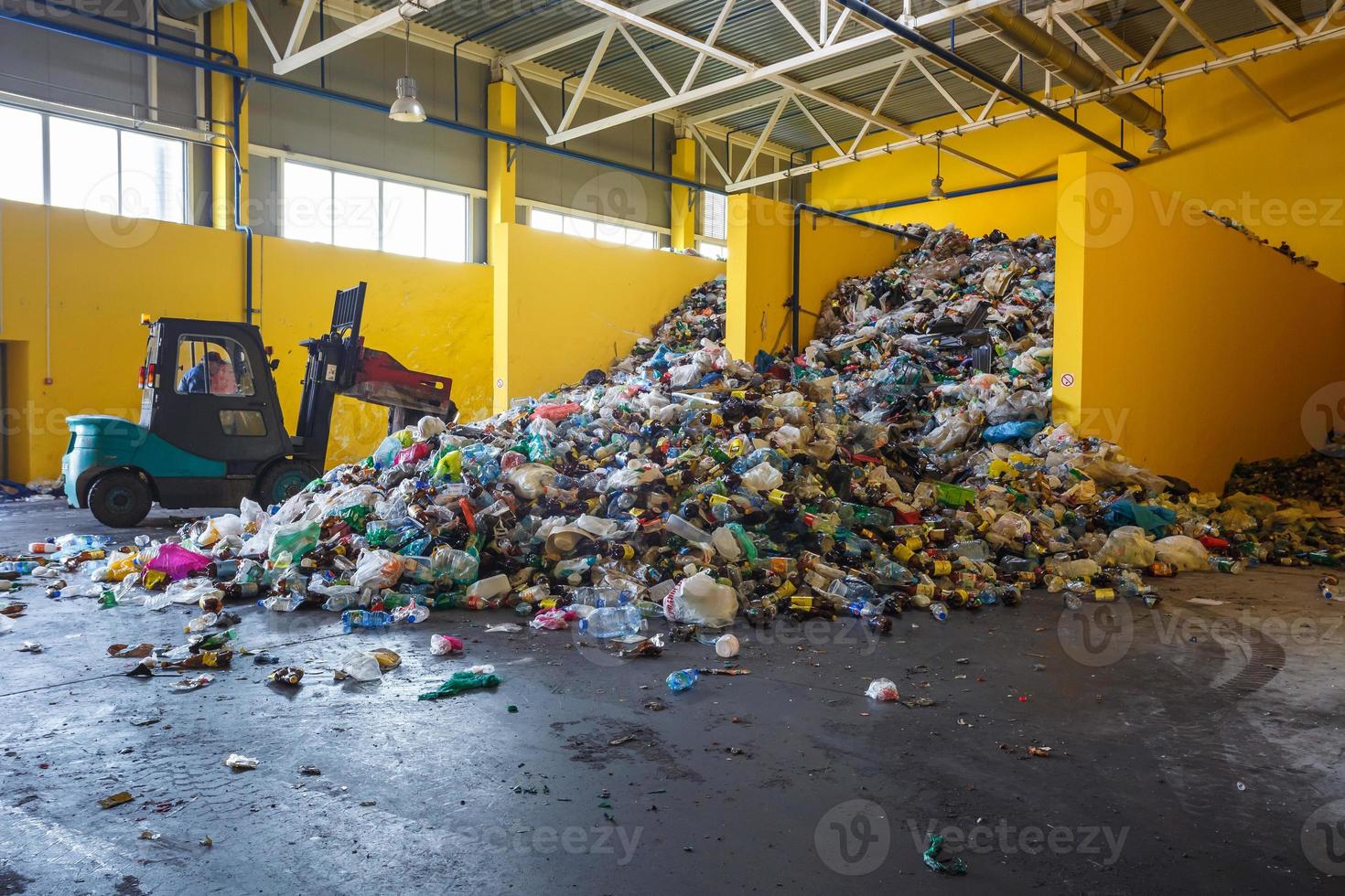 Plastic pressed bales at the modern waste hazardous processing plant. Separate garbage collection. Recycling and storage of waste for further disposal. Business for sorting and processing of waste. photo