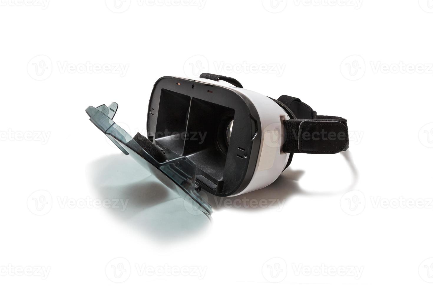 VR AR 360 virtual reality glasses cardboard for mobile phone isolated on white background. Device for watching movies for travel and entertainment in 3d space. photo