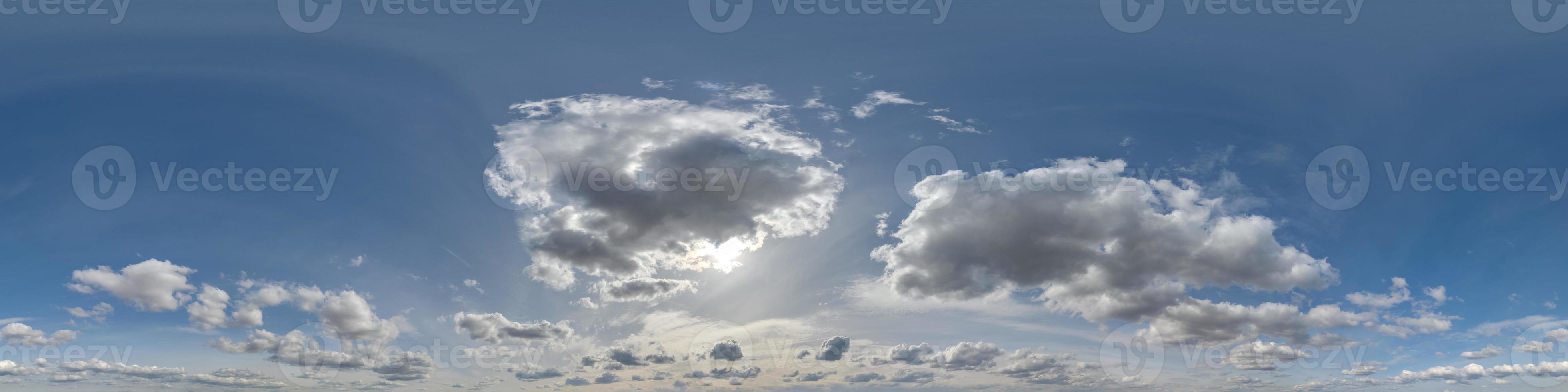 blue sky hdri 360 panorama with white beautiful clouds in seamless projection with zenith for use in 3d graphics or game development as sky dome or edit drone shot for sky replacement photo