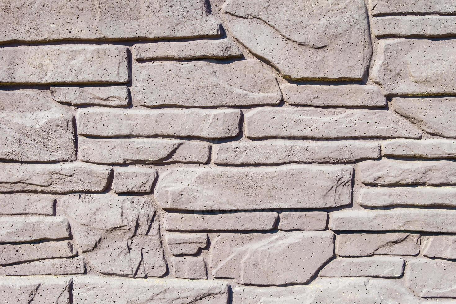 Old gray light Bricks Wall Pattern decoration texture or broken brick wall background light for loft interior or exterior. Porous concrete fence photo