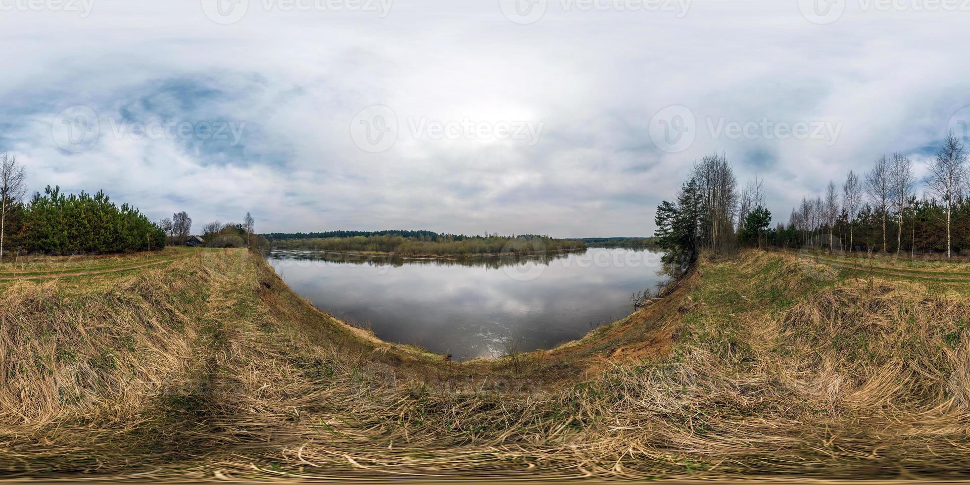 full seamless panorama 360 angle view at the high cliff of the broad river bank in sunny day. Skybox as background in equirectangular spherical equidistant projection for VR AR content photo